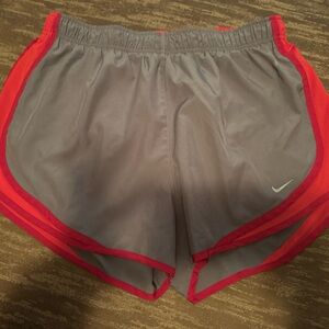 Nike Gray and Red Athletic Shorts with Curved Hem